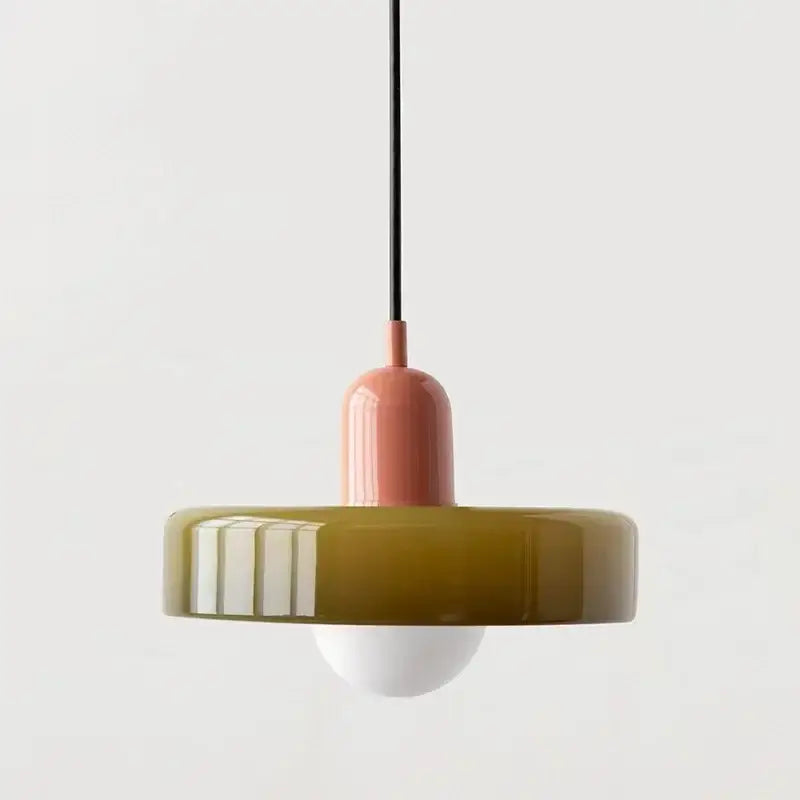 A modern glass led macaron ceiling chandelier with a matte pink stem and olive-green ribbed shade for kitchen use
