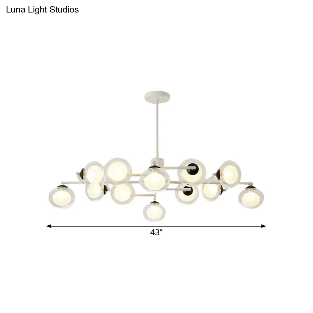 DecorBites modern white chandelier with black white metallic arms and spherical glass globes measuring 43 inches long