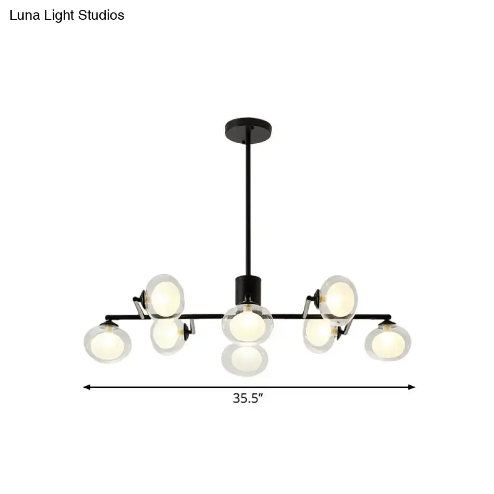 Black metal DecorBites modern oval shade island light with eight frosted glass globe bulbs in black white finish