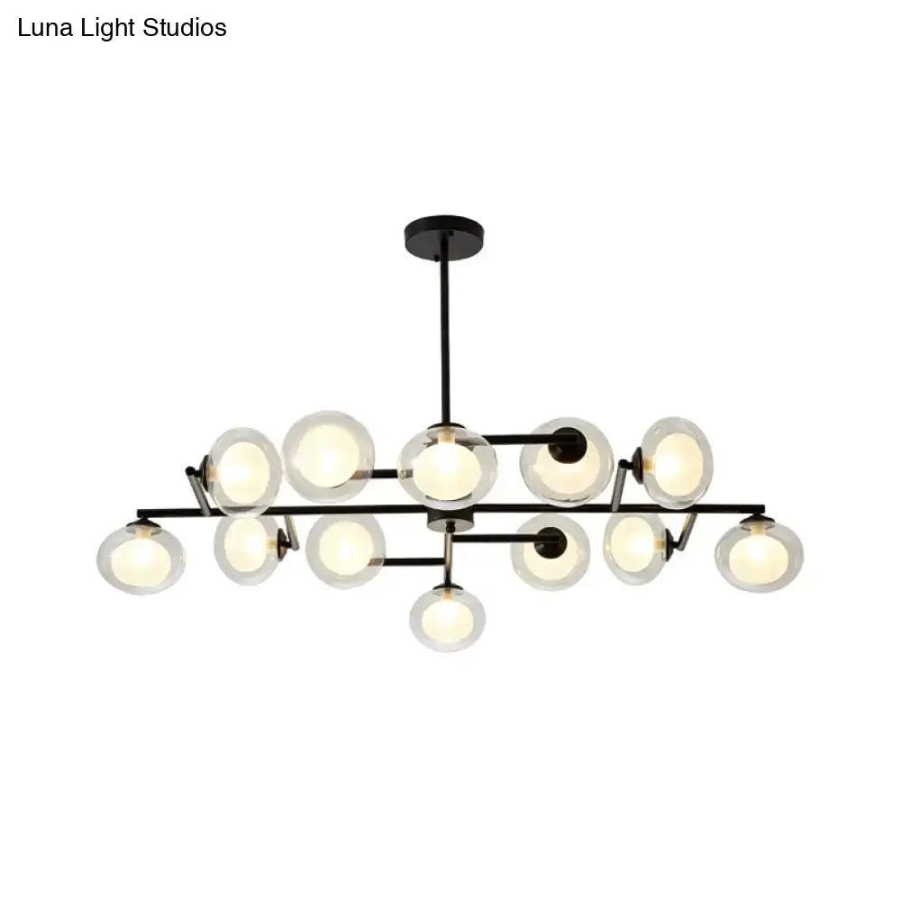 Modern black metal chandelier with multiple clear glass globe bulbs in black white for stylish island lighting