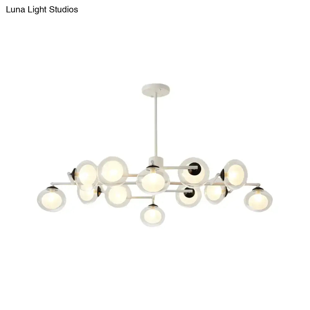 DecorBites modern oval shade island light with multiple spherical glass shades and chrome accents in black white