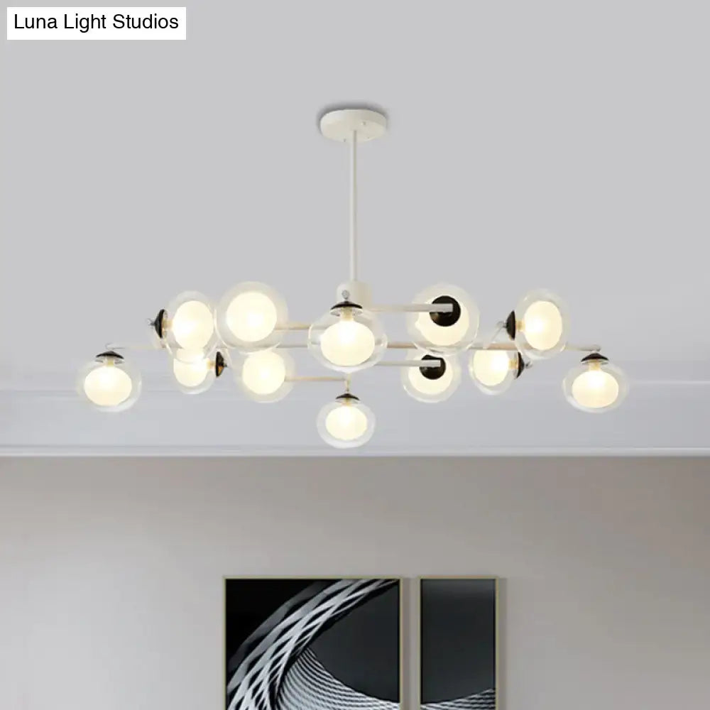 Modern white chandelier decorbites™ with multiple glass globes and black white accents for island lighting