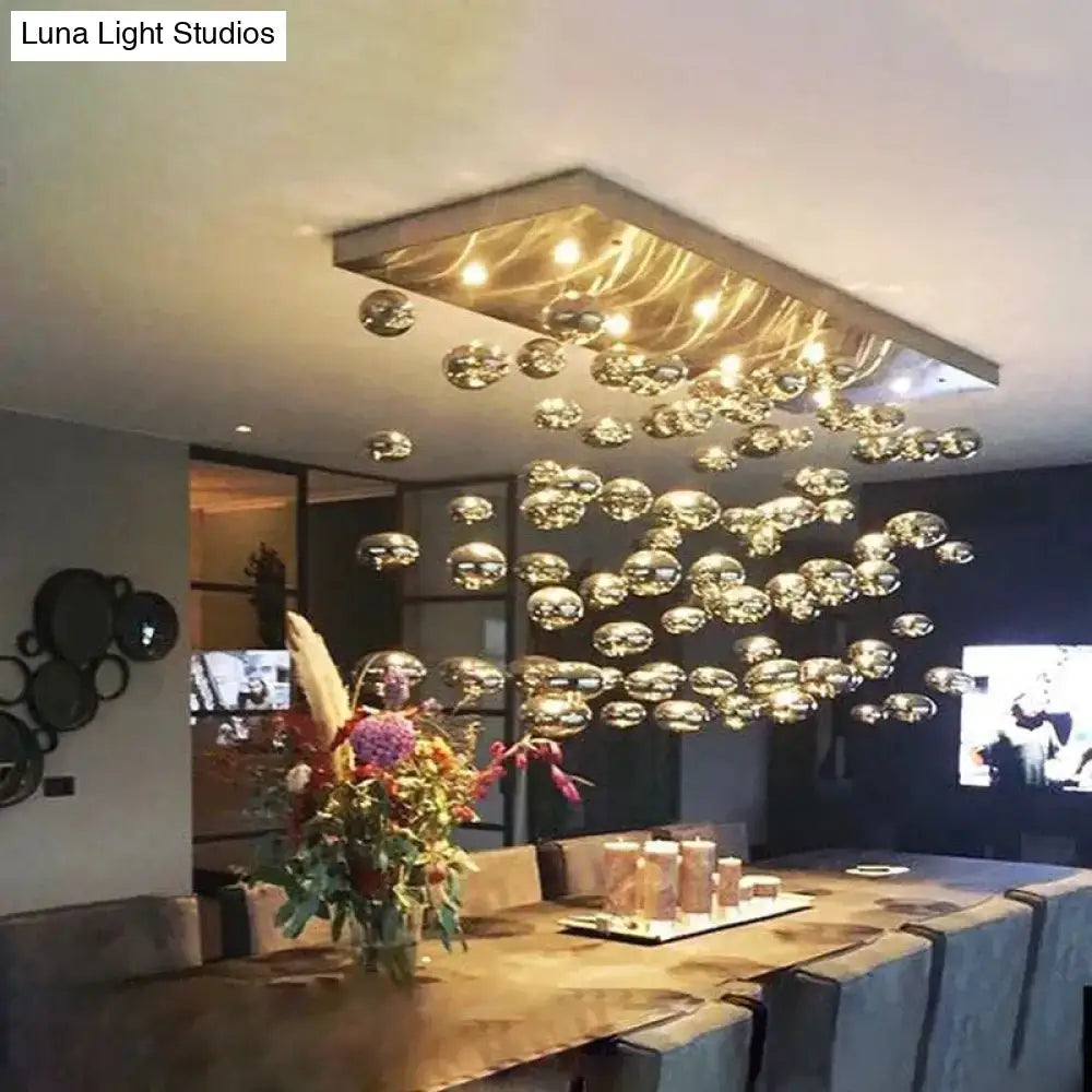 DecorBites™ modern oval bubble ball LED chandelier with metallic frame and glass orbs for dining room lighting