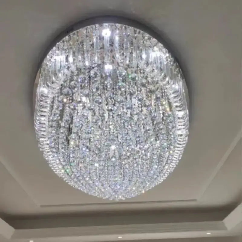Modern oval chrome and gold crystal ceiling light with cascading faceted crystals for dining room decorbites crystal dining