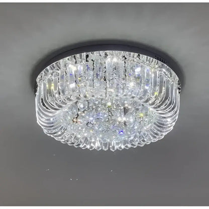 Modern oval chrome and gold crystal ceiling light with black frame and cascading prisms for dining room decorbites crystal dining