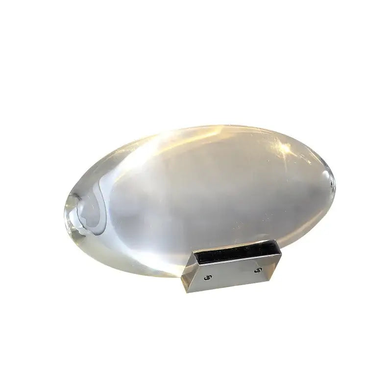 A sleek translucent oval-shaped glass sconce with polished chrome bracket for decorbites crystal led table lamp ambient lighting