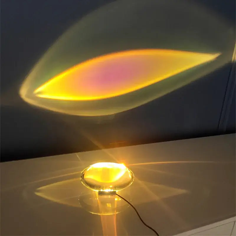 Modern oval crystal led table lamp with golden glass casts warm glow and rainbow prism for bedroom ambient lighting decorbites crystal led
