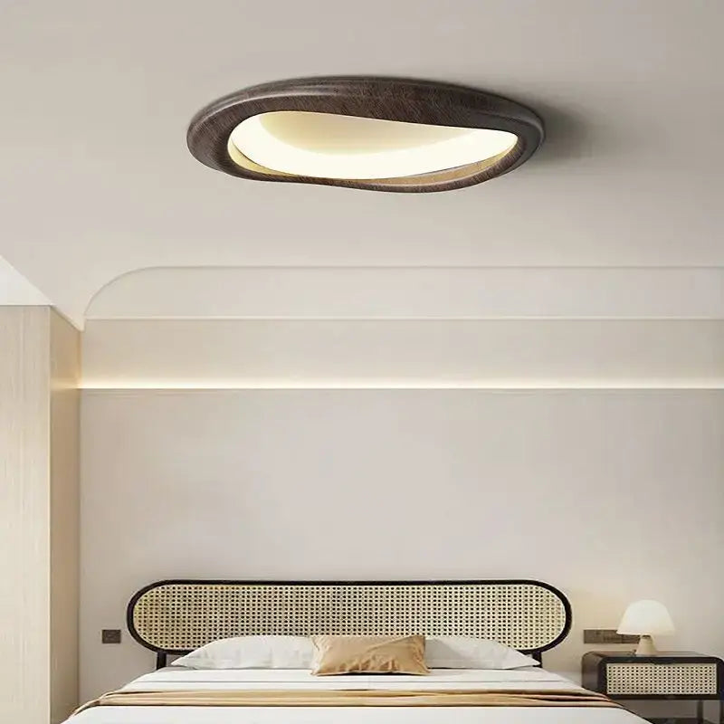 Modern oval decorbites led wood chandelier with dark textured frame and warm glowing interior for living room lighting
