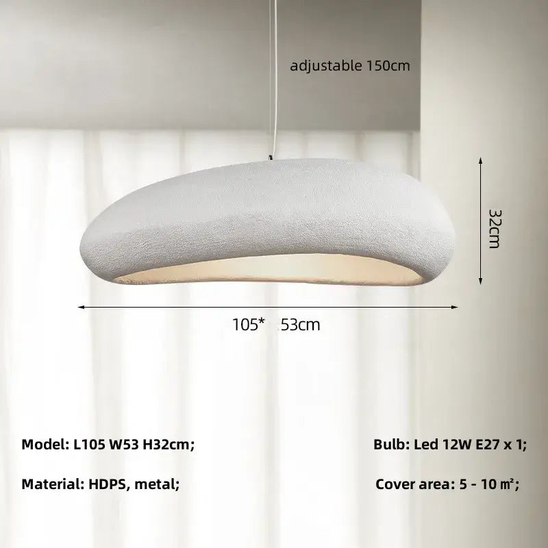 A modern oval gray and gold pendant light with textured white hdps and metal finish for decorbites loft dining rooms