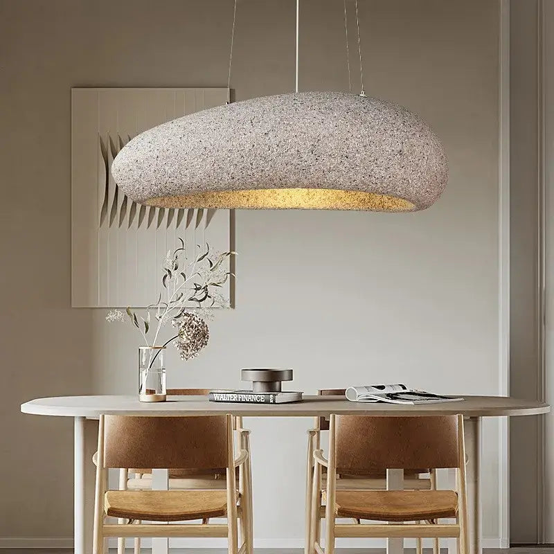 A modern oval gray and gold pendant light with textured exterior perfect for decorbites loft e27 dining room decor