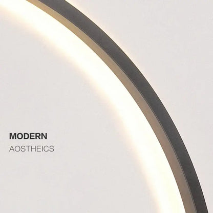 Modern oval led wall sconce with a dark metallic frame and soft glowing illumination for bedroom mirror decorbites led wall