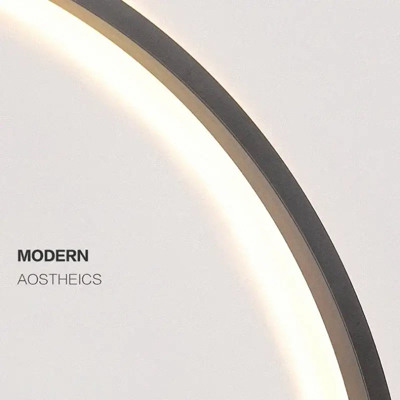 Modern oval led wall sconce with a dark metallic frame and soft glowing illumination for bedroom mirror decorbites led wall