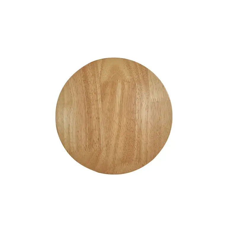 Light brown circular wooden knob showing natural grain pattern on decorbites led wooden wall lamp for bedroom decor