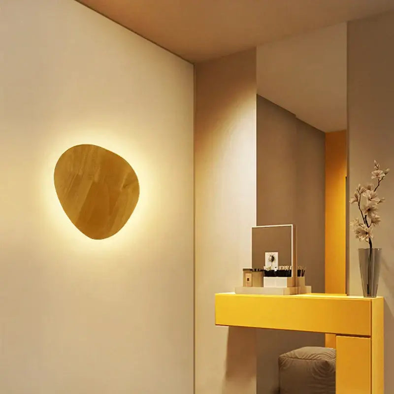 Warm-toned modern oval led wooden wall lamp with organic shape and smooth finish for bedroom decorbites led wooden use
