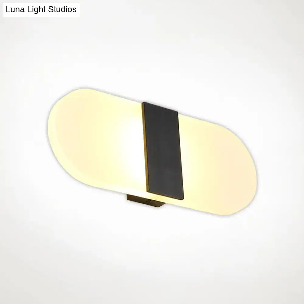 Modern oval rectangular convex led wall sconce with sleek elongated oval design and warm yellow diffused light for bedroom