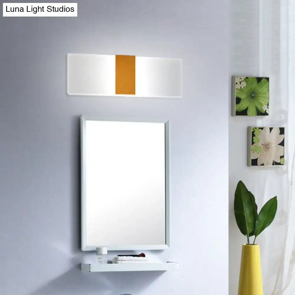 Modern oval rectangular convex led wall sconce with a sleek white frame and central vertical orange accent panel