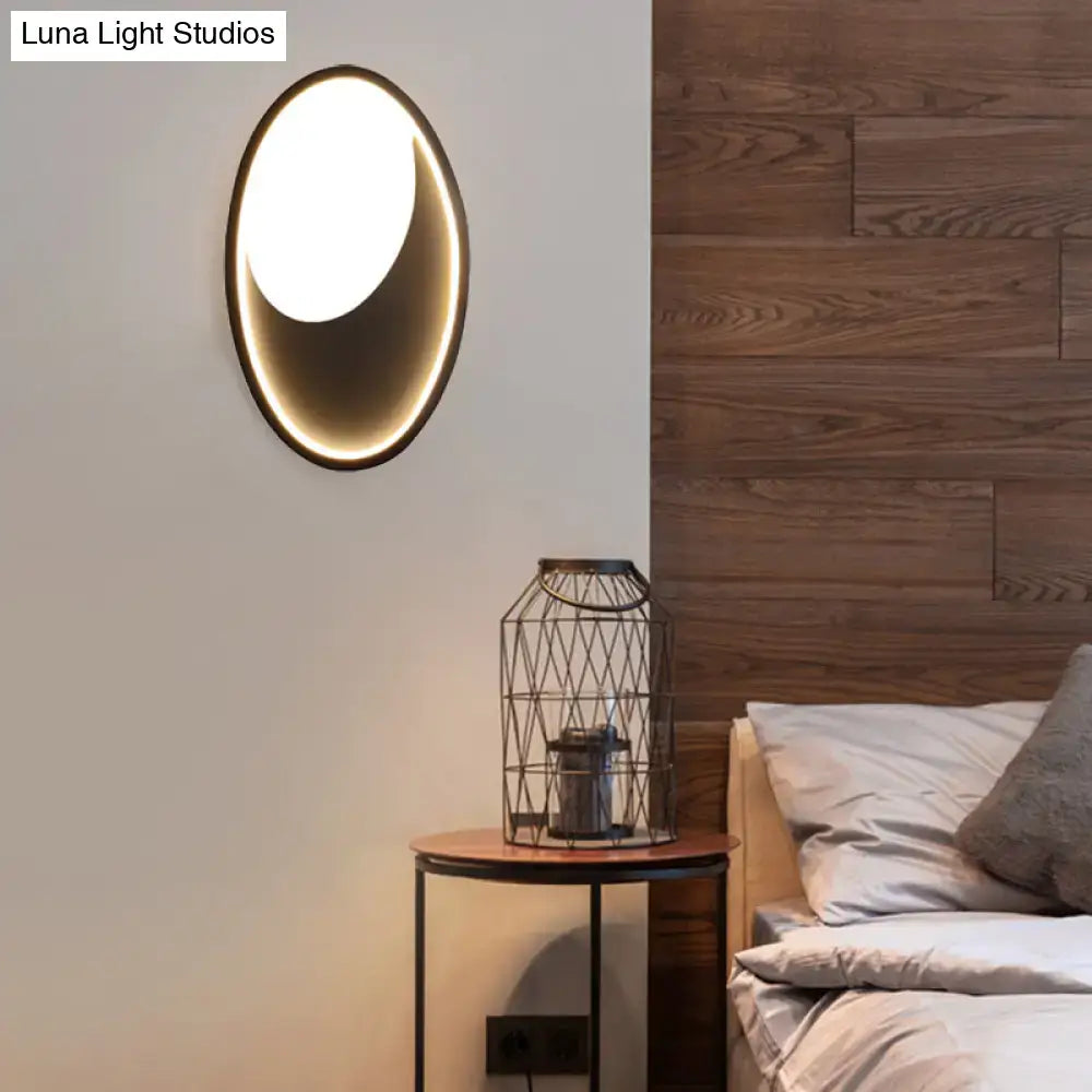 Modern oval white and black led wall lamp with sleek black frame and warm ambient lighting for 110v-120v or 220v-240v use