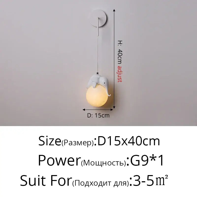 White elephant-shaped glass bedroom wall lamp with warm glowing bulb perfect for decorbites bear bedroom wall use