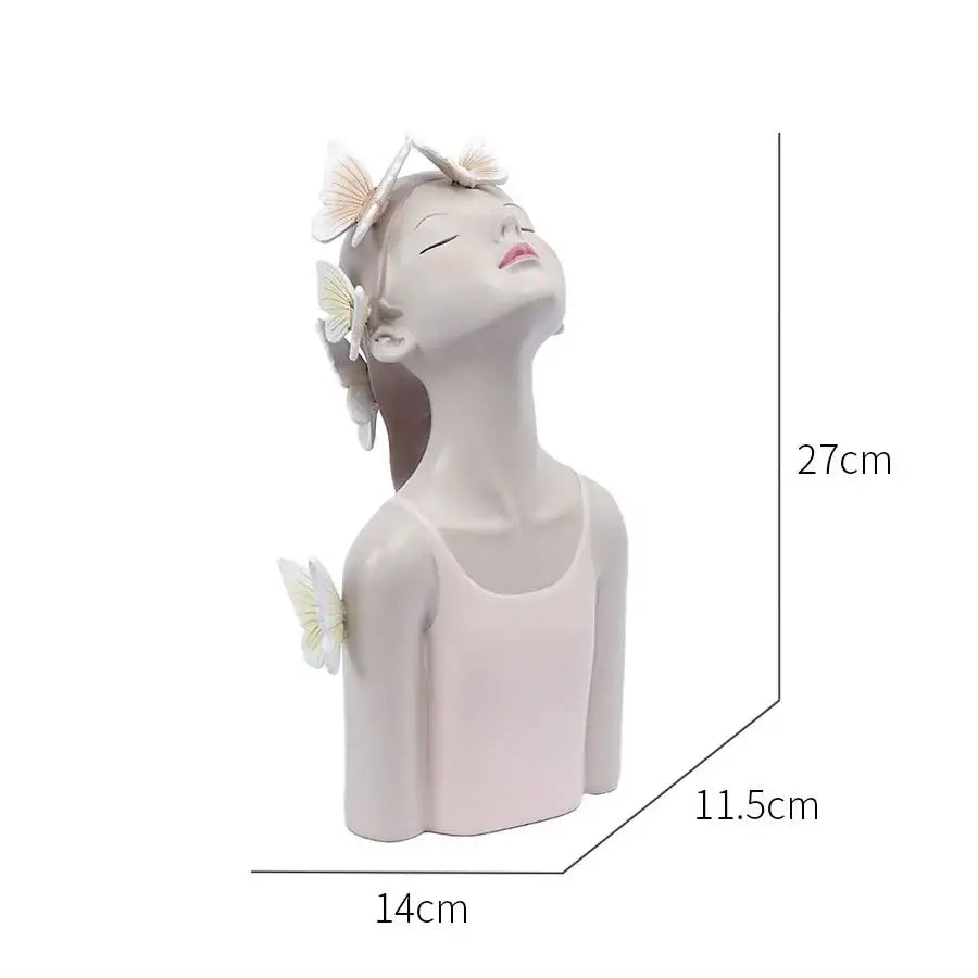 Delicate porcelain butterfly girl sculpture with white butterflies in pastel tones for modern bedroom decor