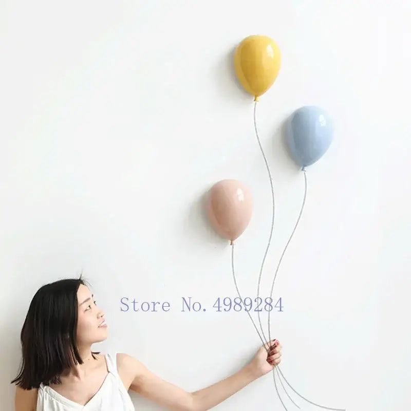 Modern pastel ceramic balloon wall hanging decoration with glossy finish and metallic strings for children room