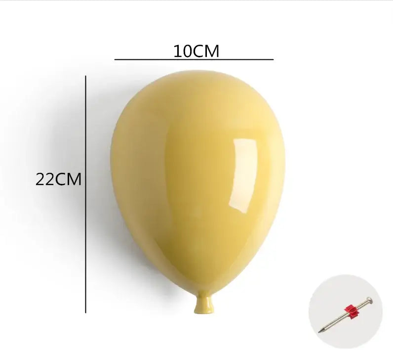 Glossy yellow ceramic balloon wall hanging decoration 22cm tall for modern pastel children room decor
