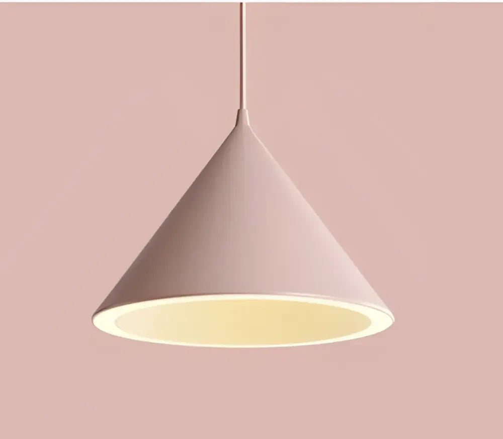 A minimalist pink pastel cone pendant light with matte finish and glowing interior featuring decorbites cone shape lighting methods
