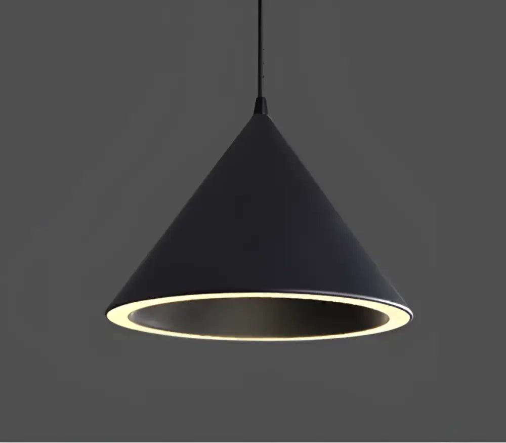 Black conical pendant light with glowing inner rim showcasing decorbites cone shape and versatile lighting methods for modern kitchen decor