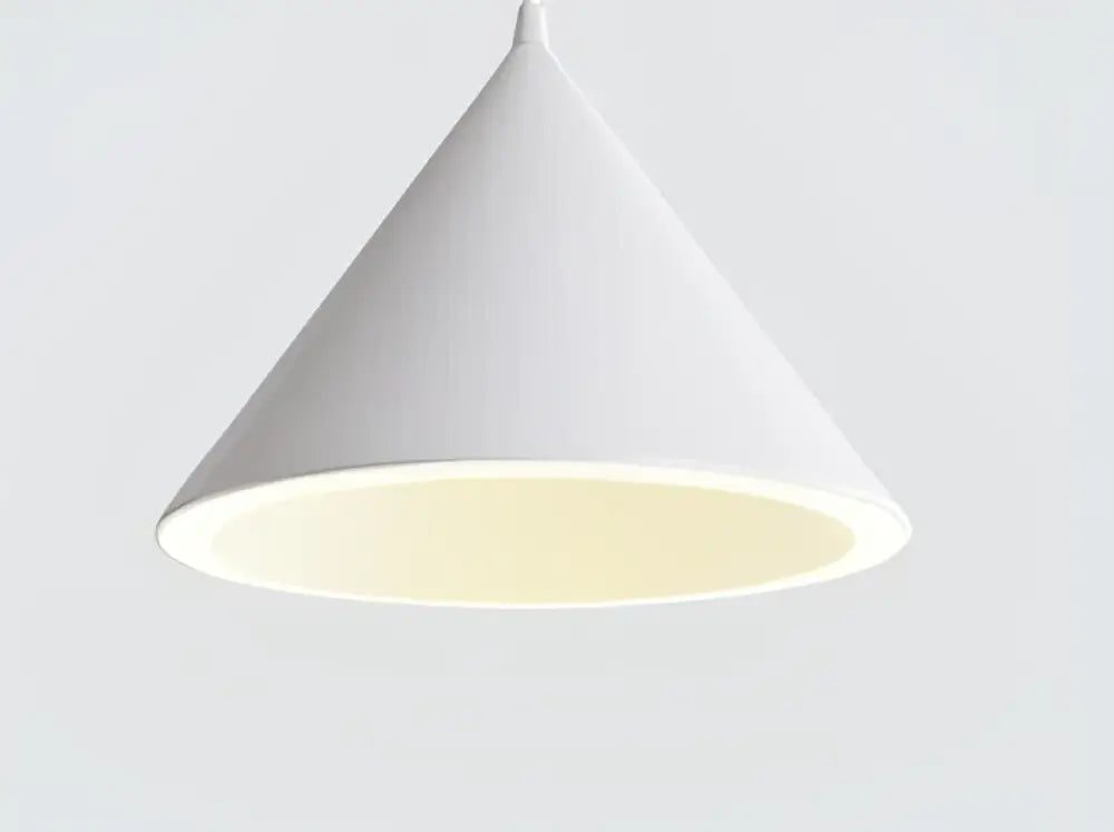 A sleek white pastel cone pendant light with softly glowing warm interior showcasing decorbites cone shape lighting methods