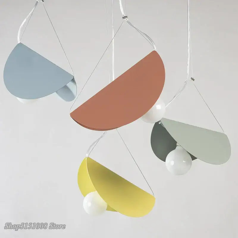 Modern pastel geometric iron pendant light with semi-circular metal shades in muted colors for dining room decorbites geometric iron pendant