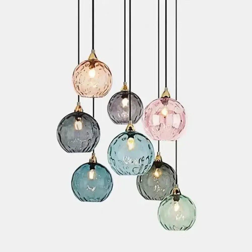 A modern pastel glass 7-globe pendant light with polished chrome fittings for dining room use in square meters