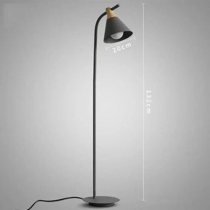Black metal floor lamp with curved neck and wooden accent on conical shade for decorbites iron macaron floor use
