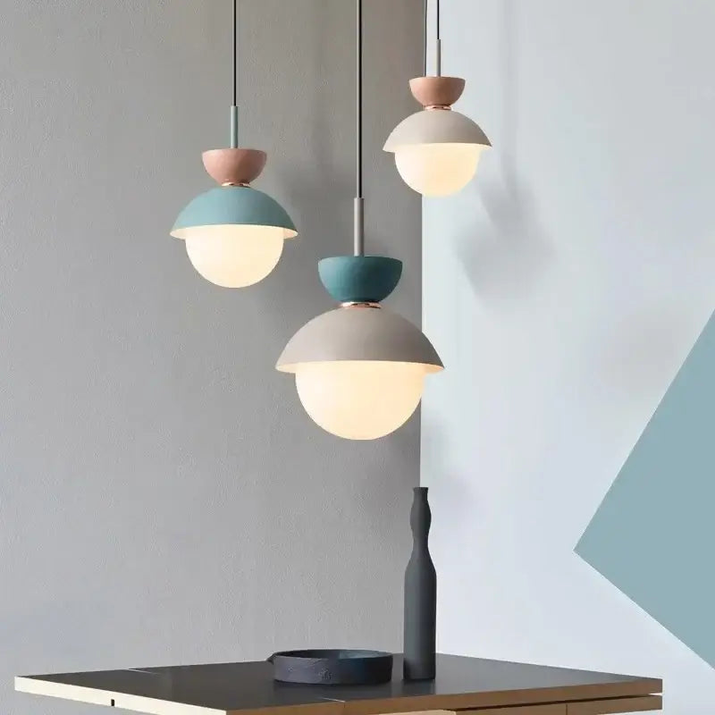 Modern pastel matte ceramic glass ball pendant lamp with sleek metal fixtures ideal for kitchen decorbites glass ball lighting