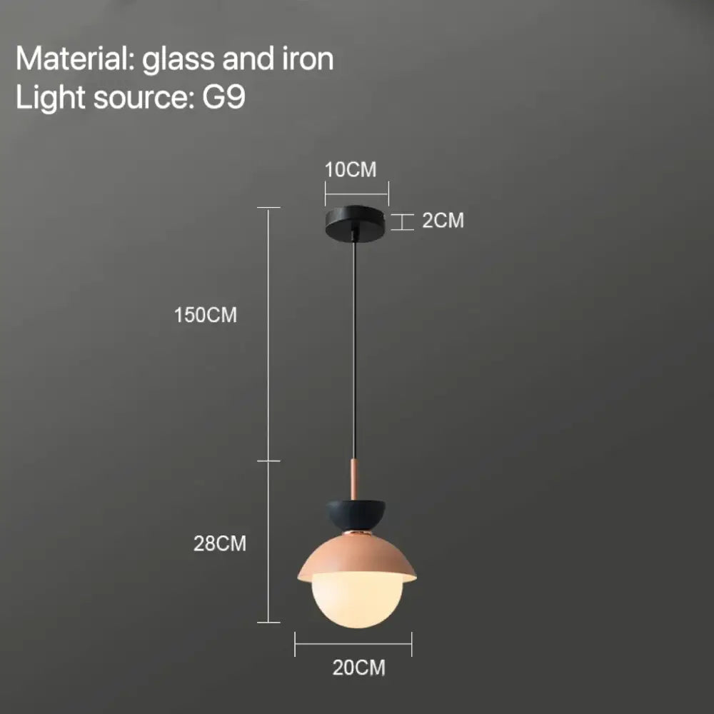 Modern pastel matte ceramic glass ball pendant lamp with a matte black iron mount and warm-toned glass shade for kitchen decorbites glass ball pendant lamp