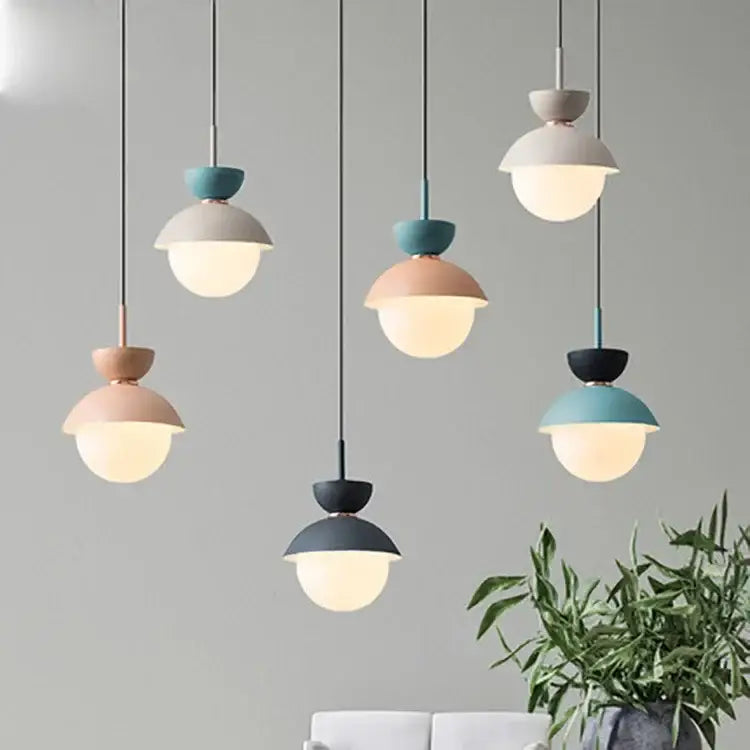 Modern pastel matte ceramic glass ball pendant lamp with warm glowing frosted glass globes for kitchen light decorbites glass ball pendant