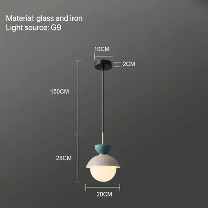 Modern pastel matte ceramic glass ball pendant lamp with frosted globe teal and white accents by black iron cable