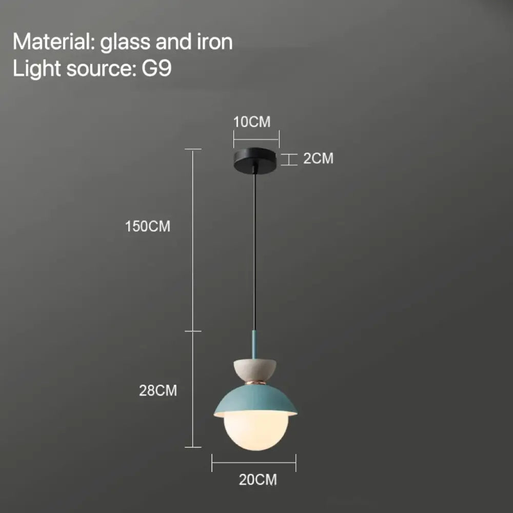 Modern pastel matte ceramic glass ball pendant lamp with a matte teal glass shade and black iron fixture decorbites glass ball pendant