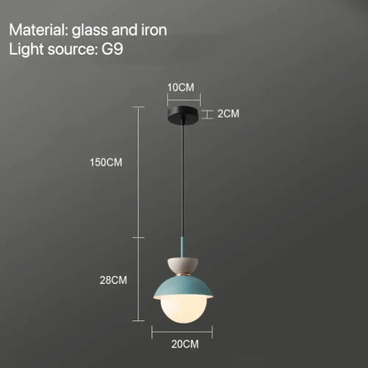 Modern pastel matte ceramic glass ball pendant lamp with a matte teal glass shade and black iron fixture decorbites glass ball pendant