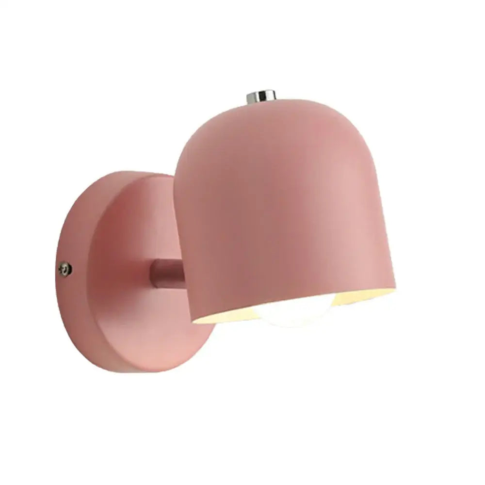 Modern pastel pink dome-shaped matte iron wall light fixture with chrome accent ideal for bedroom use