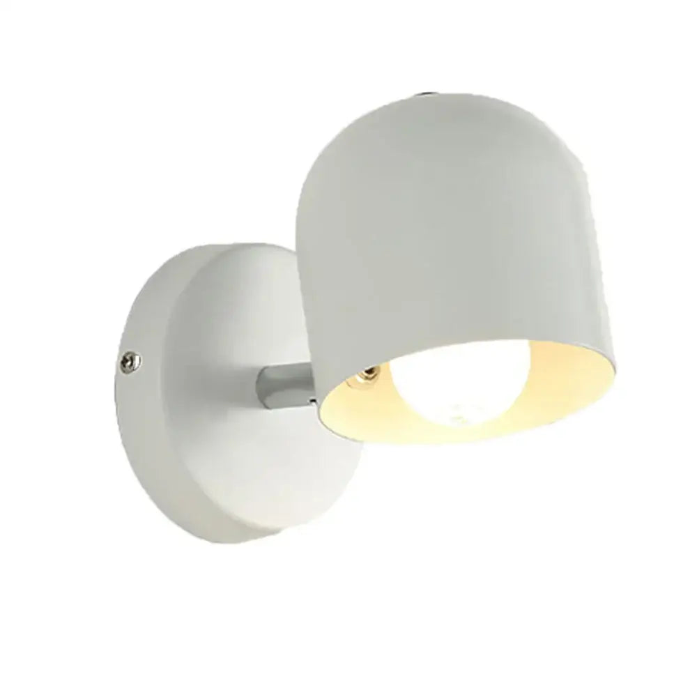 White matte pastel iron wall light fixture with rounded dome shade and sleek metallic arm for bedroom use