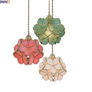 Three pendant lights with pastel petal colorful glass led shades in pink, mint green, and cream for modern decorbites decor
