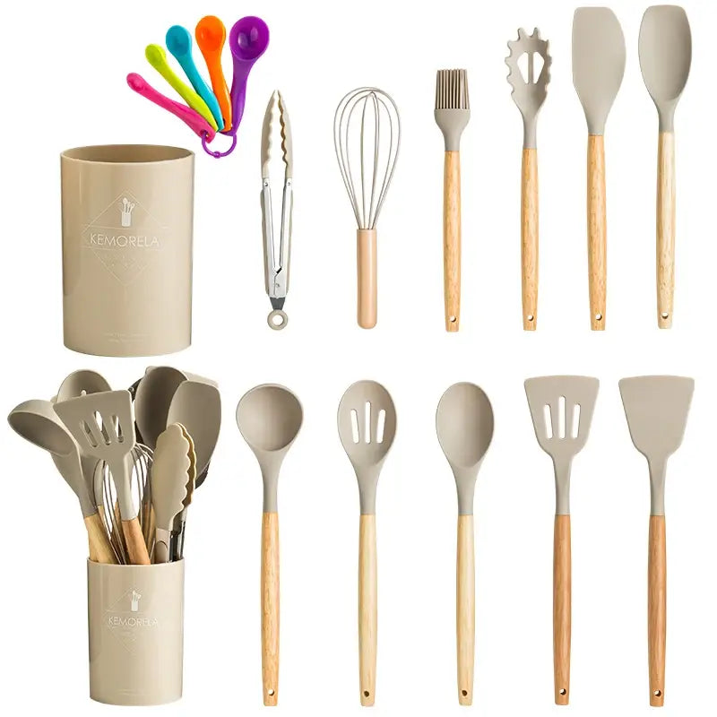 Beige silicone kitchen utensil set with wooden handles and matching storage canister in modern pastel design