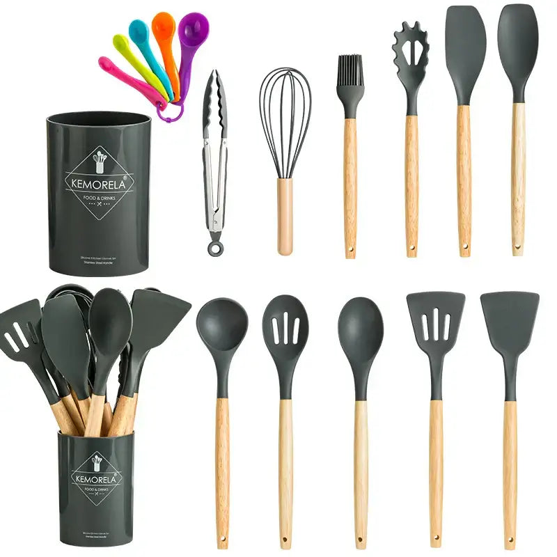 Black silicone kitchen utensil set with wooden handles and matching storage canister for modern pastel kitchen use