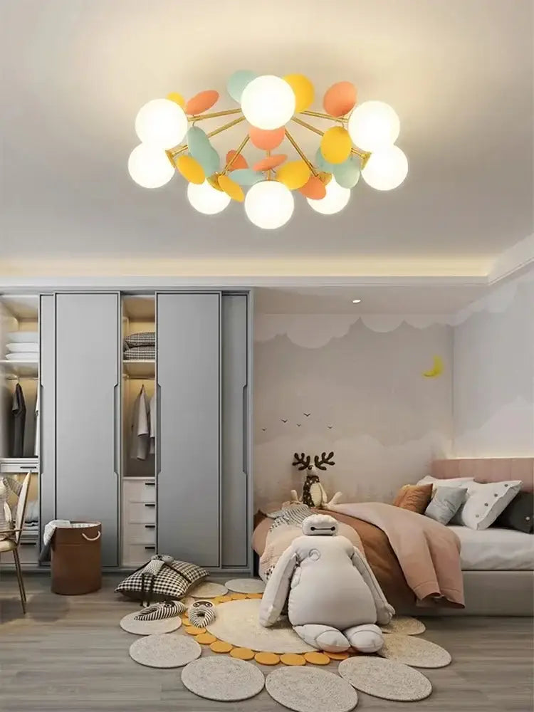 Modern pastel spherical frost glass ceiling chandelier with gold-toned arms and soft glowing bulbs for bedroom decorbites frost glass