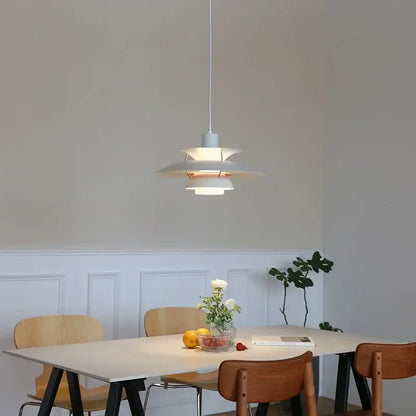 Modern pastel tiered led chandelier pendant light in white with minimalist design and subtle copper accents for kitchen decor