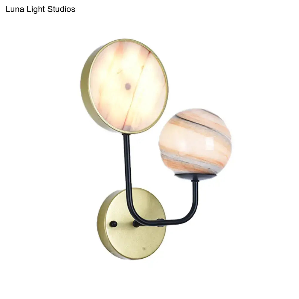 Modern two-light sconce light with brushed brass base and peach cream glass shades for bedroom fixture inches fixture