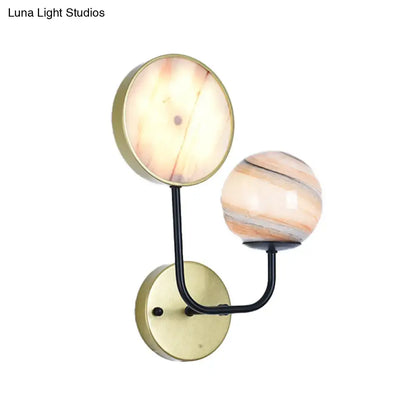 Modern two-light sconce light with brushed brass base and peach cream glass shades for bedroom fixture inches fixture