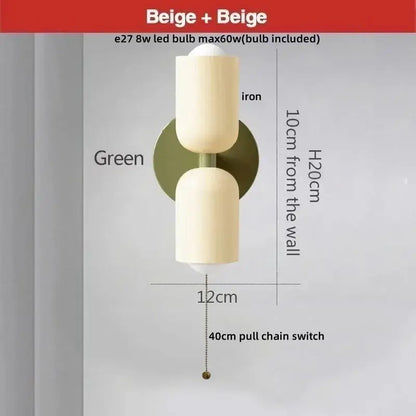 Beige and green two-light wall sconce with iron mounting plate for modern peach and cream decorbites led wall lights