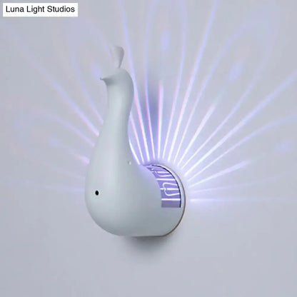White peacock wall sconce with sleek modern design and glowing purple light rays for bedroom rainbow projection light