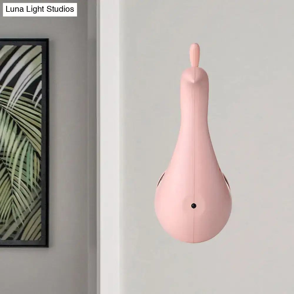 Modern peach peacock wall-mounted speaker in sleek matte pink with black accents for bedroom rainbow projection light