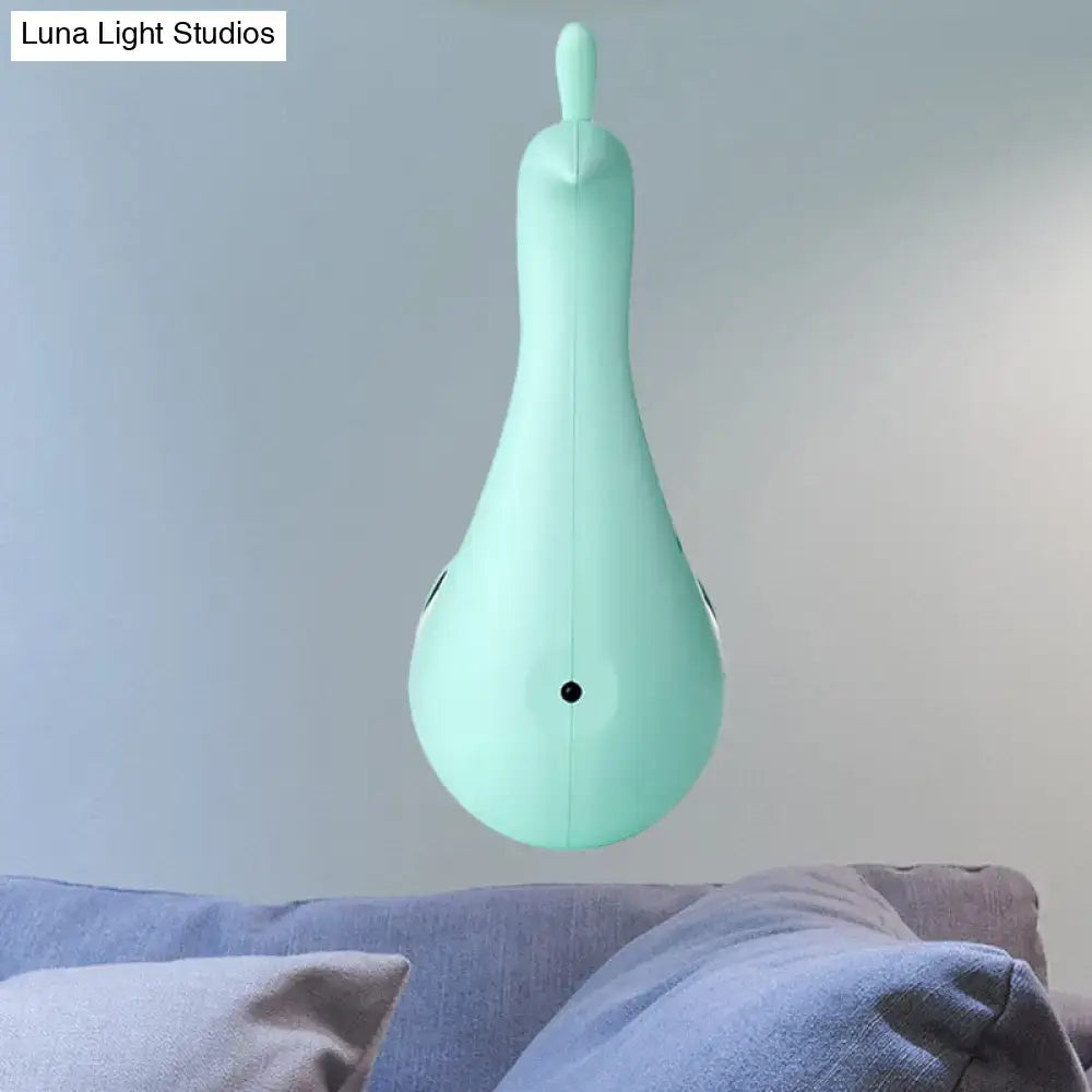 A sleek mint-green matte peacock wall sconce with teardrop shape and black accents for bedroom rainbow projection light